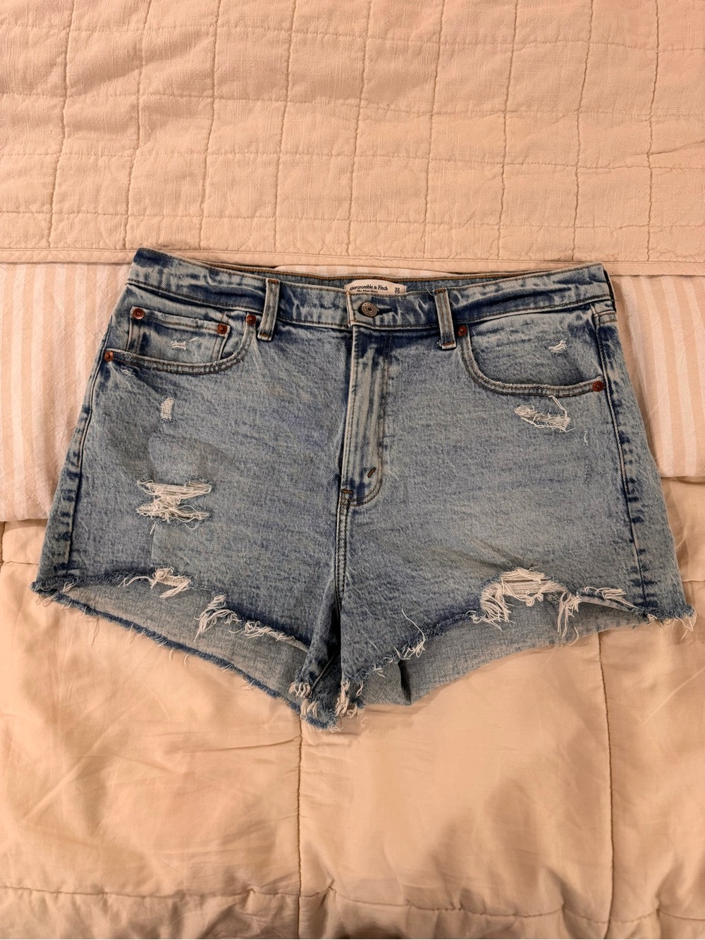 Abercrombie & Fitch Distressed Denim Cutoff Shorts. The mom short high rise